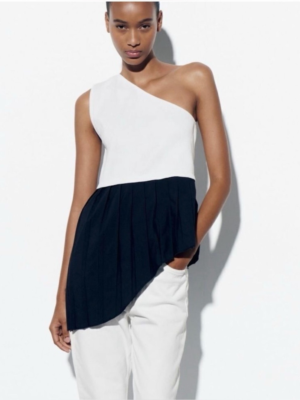 ZARA TOP WITH CONTRASTING HEM BLACK AND WHITE ASYMMETRIC NECKLINE , size M
